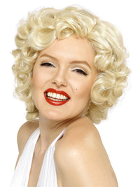 woman wearing blonde wig and makeup like Marilyn Monroe